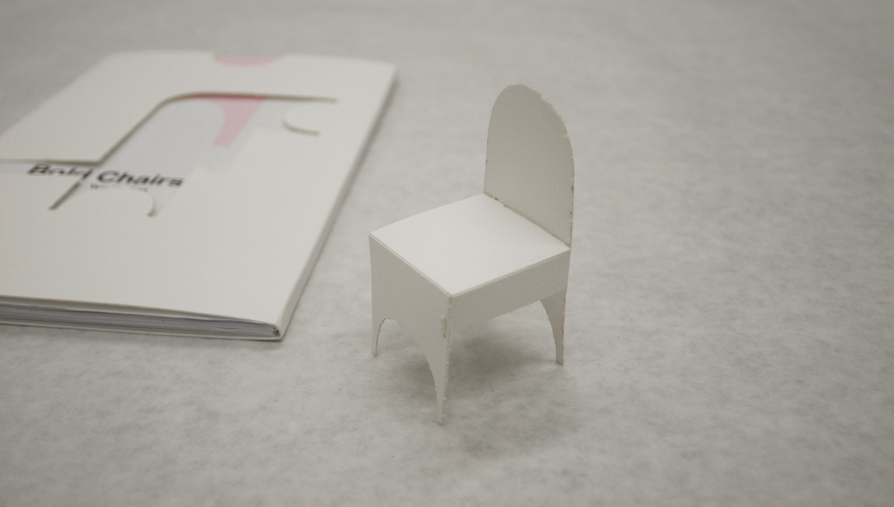 View of a folder chair created from the cover sleeve cutout.